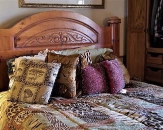 Wonderful queen bed with decorative pillows and animal print comforter. Queen mattress also for sale.