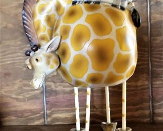 A giraffe with boots? Too cute!