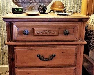 Night stand that matches the bedroom set.