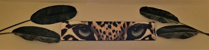 The eyes have it! Fabulous leopard eyes art and palm leaves.