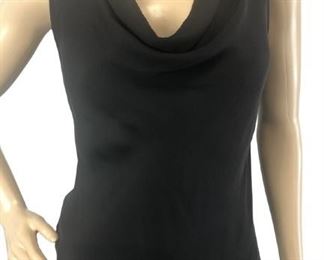 VTG EMANUEL UNGARO BLACK SILK BLOUSE SIZE 6/40
- 100% SHEER BLACK SILK
- SLEEVELESS
- ADJUSTABLE NECKLINE (WITH SNAP BUTTONS)
- GOOD VINTAGE CONDITION