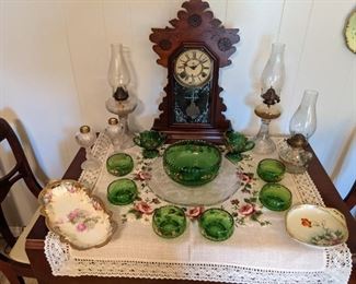 Working antique Waterbury clock, old oil lamss, antique green berry set