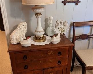 Antique Pine chest that has an oak top and is hand painted on front