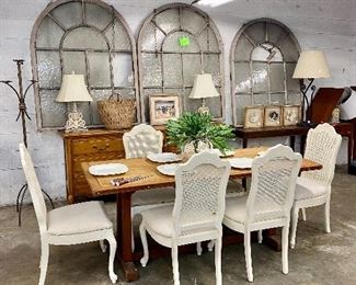 Farm table
Set of white cane back chairs
3 Cool domed windows with chains for hanging them
Long dresser