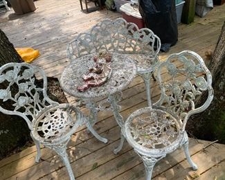 iron outdoor table, 2 chairs and bench