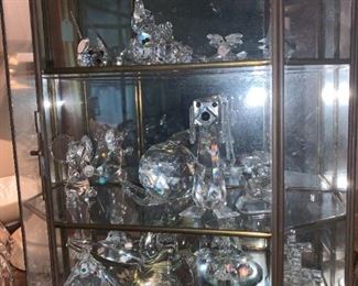 various tiny glass and/or crystal figures