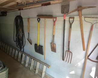 Outdoor Garden And Yard Tools Including Aluminum Extension Ladder, Shovels, Pitch Fork, Pick Axe, Rakes, Saws, Hoses Etc.