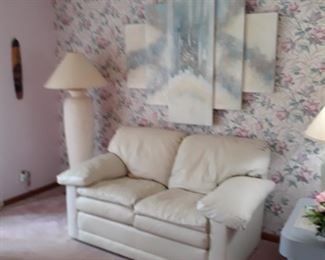 Matching Love Seat, nice floor lamp  and wall decorations 