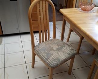 Chairs in kitchen with table