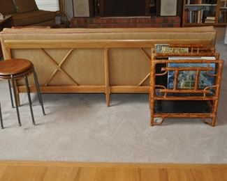 Tomlinson MCM upholstered sofa (72” long x 28.5/16” high x 33” deep) and matching chair (31” wide x 28.5/16” high x 32” deep), both with crisscross wooden back, Tomlinson Sophisticate MCM cocktail/bar/storage table 1950s (33” square x 23” high), MCM teak plywood set of four round stools w/three metal legs (13” diameter x 18” tall), 
rattan vintage magazine rack from Gump’s
