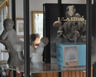 Lladro matte boy w/cymbal #4613 retired 
Lladro matte Geisha girl arranging flowers vase #4840
Lladro matte girl resting in tree w/book 
Lladro matte girl w/basket feeding bird 
