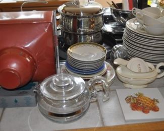 vintage Pyrex glass tea pot, flower sifter, All-Clad gourmet 12qt multi-cooker w/two steamer baskets and lid NIB, Arcoroc Classique glass mugs, Belgique cookware, cookbooks, Cristal D'arques-Durand red pressed glass plates, glasses, Dansk Bistro Christianshavn set of four blue/white flat coffee/tea mugs, Dansk Flora, Farberware cookware, Farberware vintage Country Crock #266 NIB, FSP chrome bowls for electric stove NIB, Hamilton Beach vintage avocado green electric NIB, kitchen gadgets, Kitchenaid hand mixer, Krups coffee grinder, Krups Universal folding electric kitchen slicer, Maxim electric crepe maker, Mikasa Sunny Window 1976 china, Nordic Ware muffin popover pan NIP, Nordic Ware Tender Cooker, Oasis Collection Giftcraft red flower green trim dinnerware from Molbaks, Royal Worcester Pastorale china, Presto 11” electric skillet w/glass cover, Pyrex clear baking dishes, Revere Ware cookware, Sears Tradition USA stainless flatware “Fiamma”, The Pampered Chef springform pan set, Sunbe