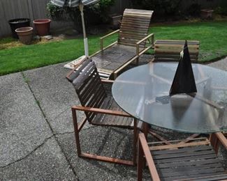 outdoor patio set, DCS barbecue, vintage cast iron 2' square umbrella stand, adjustable umbrella, pots and planters, windchime