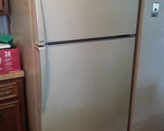 AMANA Refrigerator and Freezer. 67 x 33 x 39. (Approximately)