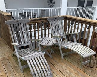 Teak lounge chairs and small table