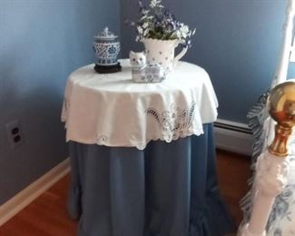 Table with tablecloth & decorative accents