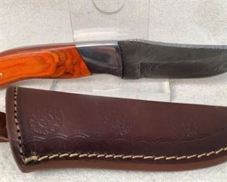 10 Image(s)
Mfg - Custom Hand Made Damascus
Model - Steel Knife 3.75" Blade
Located in Chattanooga, TN
This lot contains a Custom hand made Damascus steel knife. This knife has a 3.75" blade with a Tiger orange stained wooden handle, overall length of 8". Full tang design with custom leather embossed sheath.