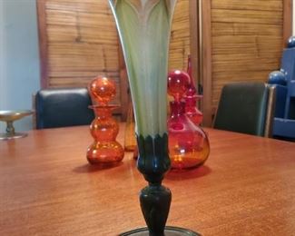Beautiful early Tiffany vase. No condition issues at all. Vase stands at 11.5 inches tall. Base is stamped Tiffany Studios 1045.