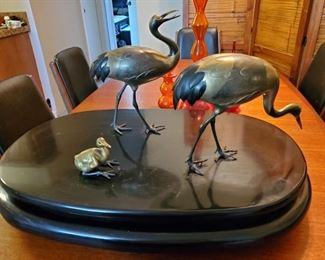Brass crane family on lacquer stand by Hideaki Kabuki