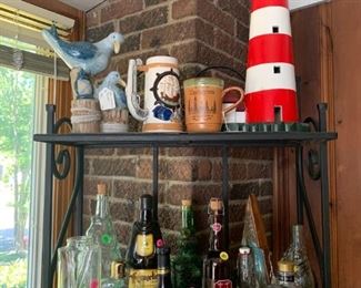 Lighthouse, steins and collection of bells