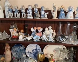 Collection of figurines, plates and vases