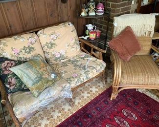 Wicker love seat and chair, throw pillows
