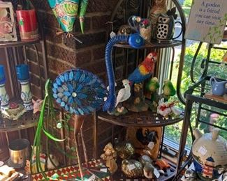 Colorful birds, metal stands and collectables