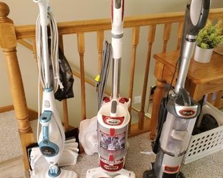 Vacuums and lots of cleaning supplies