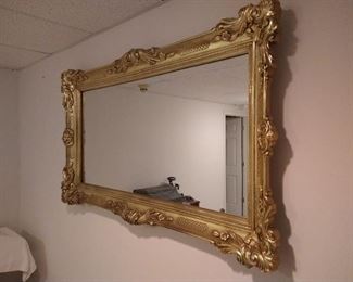 Almost 5 Feet Wide X 3 Feet Tall!  Heavy weight Designer mirror, only $150. firm.