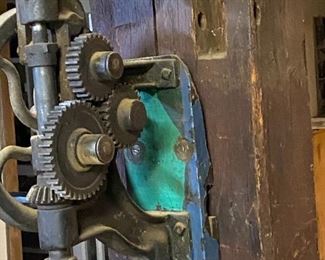 Vintage wall-mounted hand operated drill press