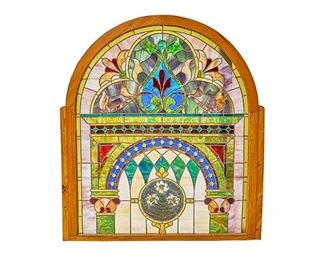 Fantastic arched stained glass panel, classical English motif, hand painted accents  63"h x 56"w 