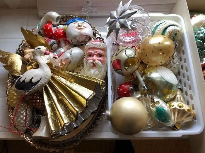 Large selection of antique and vintage Christmas ornaments.