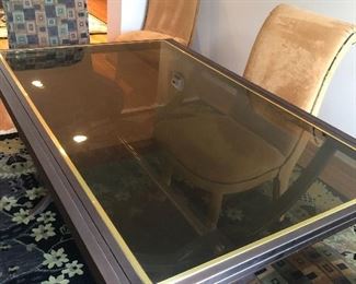 glass dining table opens to double in size w/6 custom chairs