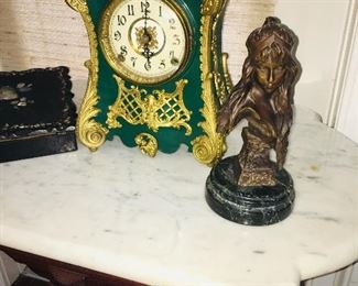 F E Kroeber mantle clock finished in green lacquer and gilt  Notice the Art Nouveau but of girl "Carmela" by Villanis on an Eastlake marble top table
