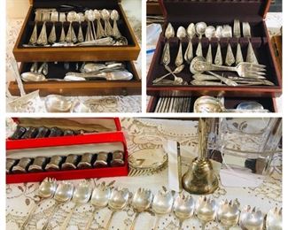 Sterling silver including two very large sets of International "Fontaine", Cartier sterling salt shakers, and sterling "Fontaine" ice cream forks