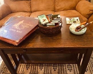fine Arts and Crafts era table, tobacco tins, old pipes and two 1880 era books about the Civil War battles and the Confederate army (fascinating)
