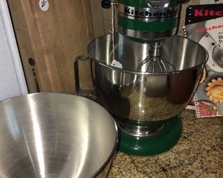 barely used Kitchen Aide mixer that comes with sealed in box food grinder