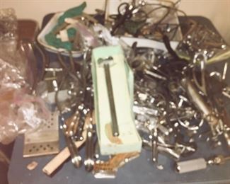 tables laden with St. Anne infirmary medical tools--the forceps might have delivered you