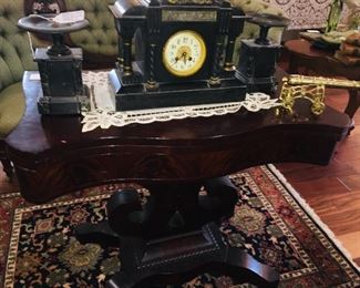 flip top Empire game table with three piece garniture--English mantle clock with matching candle holders