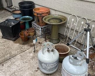 propane tanks, bird baths, planters