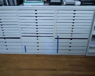 Metal art and paper shelf in the craft room