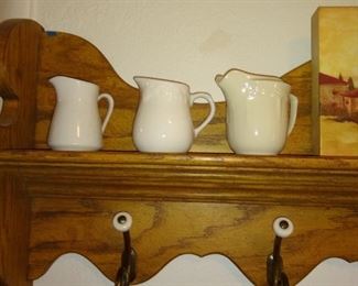 Hall Shelf with stoneware pictures