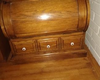 Small little golden oak desk piece with drawers