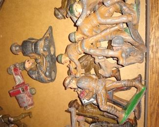 Some metal and some plastic toy soldiers some World war I some World war II