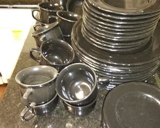 These are black dinner plates with many extras.