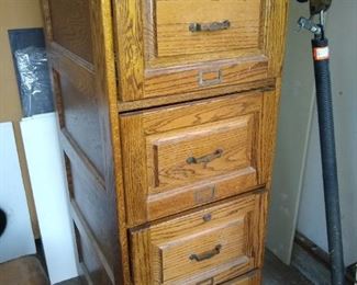 Oak four drawer file cabinet
