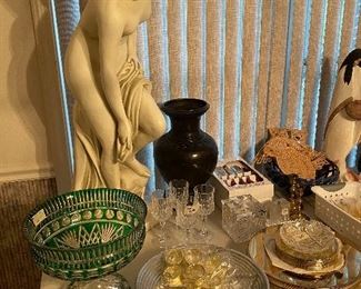 TALL NUDE FIGURE,PLASTIC/LARGE GREEN FOOTED CUT TO CLEAR CONSOLE BOWL/GLASS SLIPPERS/MEX. METAL BOWL/STACK OF CHARGERS 
