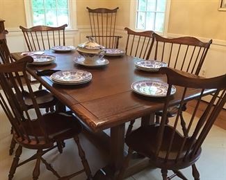 6 side chairs, D.R. DIMES and 2 armchairs., Oak trestle extension table with 2 additional leaves.