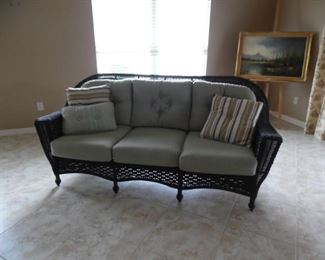All weather wicker, 3 cushion sofa