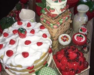 Strawberry Shortcake cake cover,  strawberry decorated tins and mini mugs.